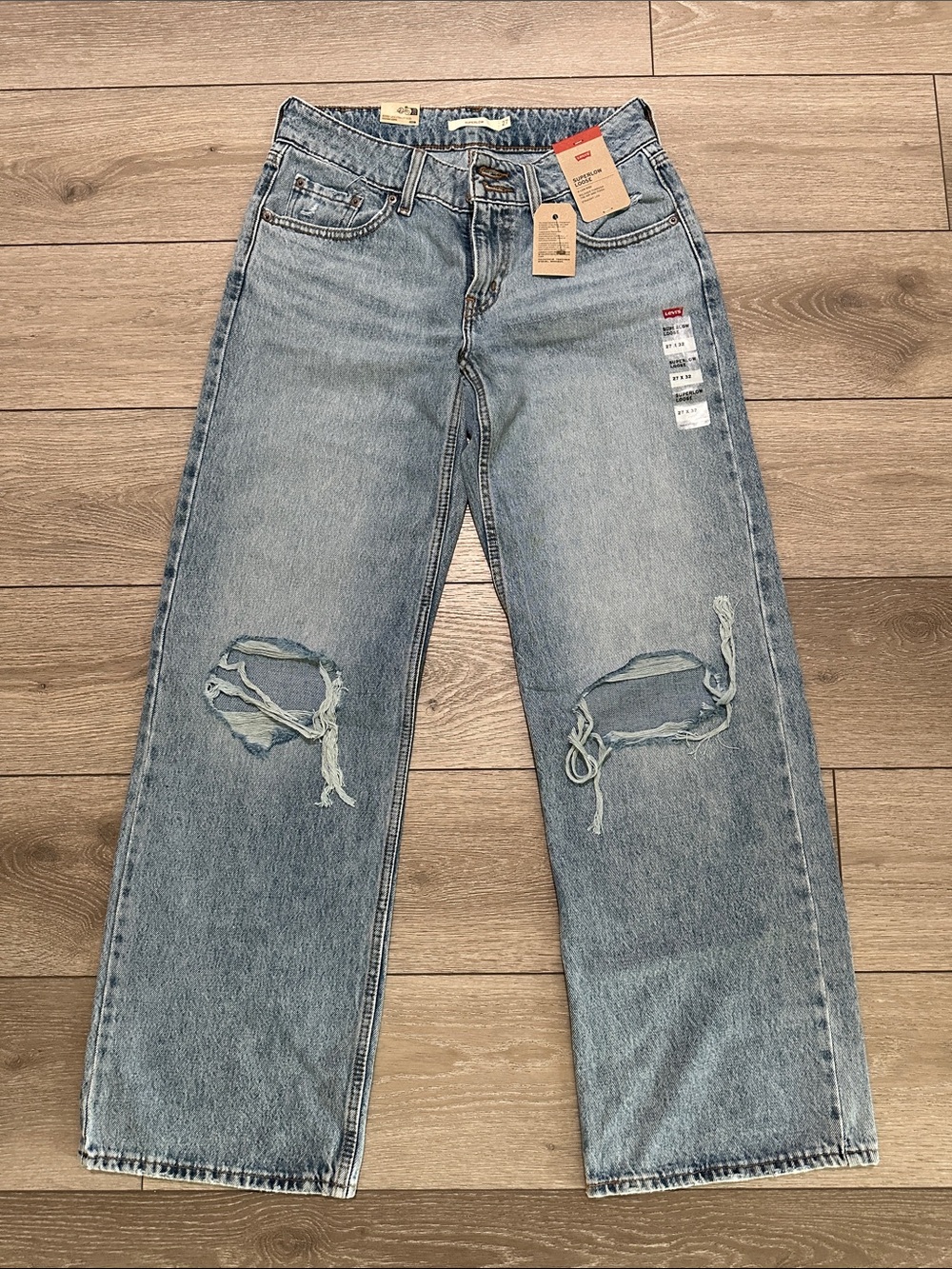 Levi's Women's Light Blue Ripped Boyfriend Jeans